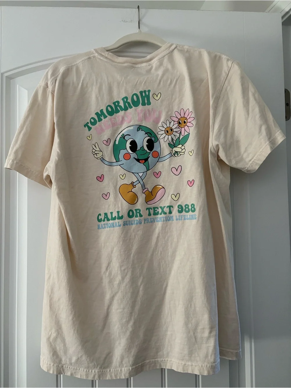 Comfort Colors Cream Short Sleeve Tee with Smiling Earth Graphic